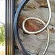 Forged iron mirror and gilded brass