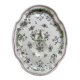 Oval Moustiers plate in cream and green earthenware, 18th century.