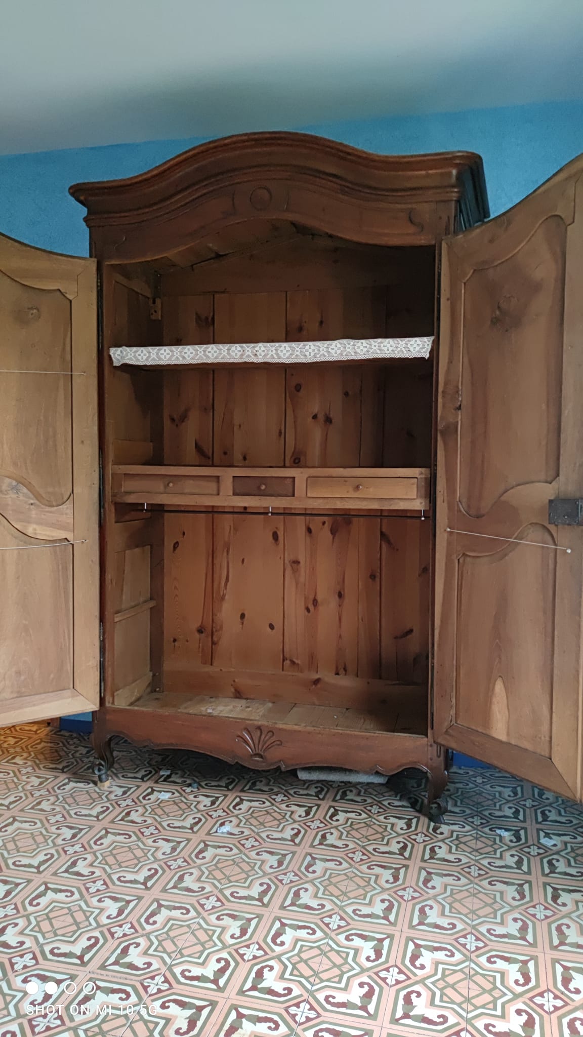 Large Louis XV style gendarme's hat-shaped wardrobe