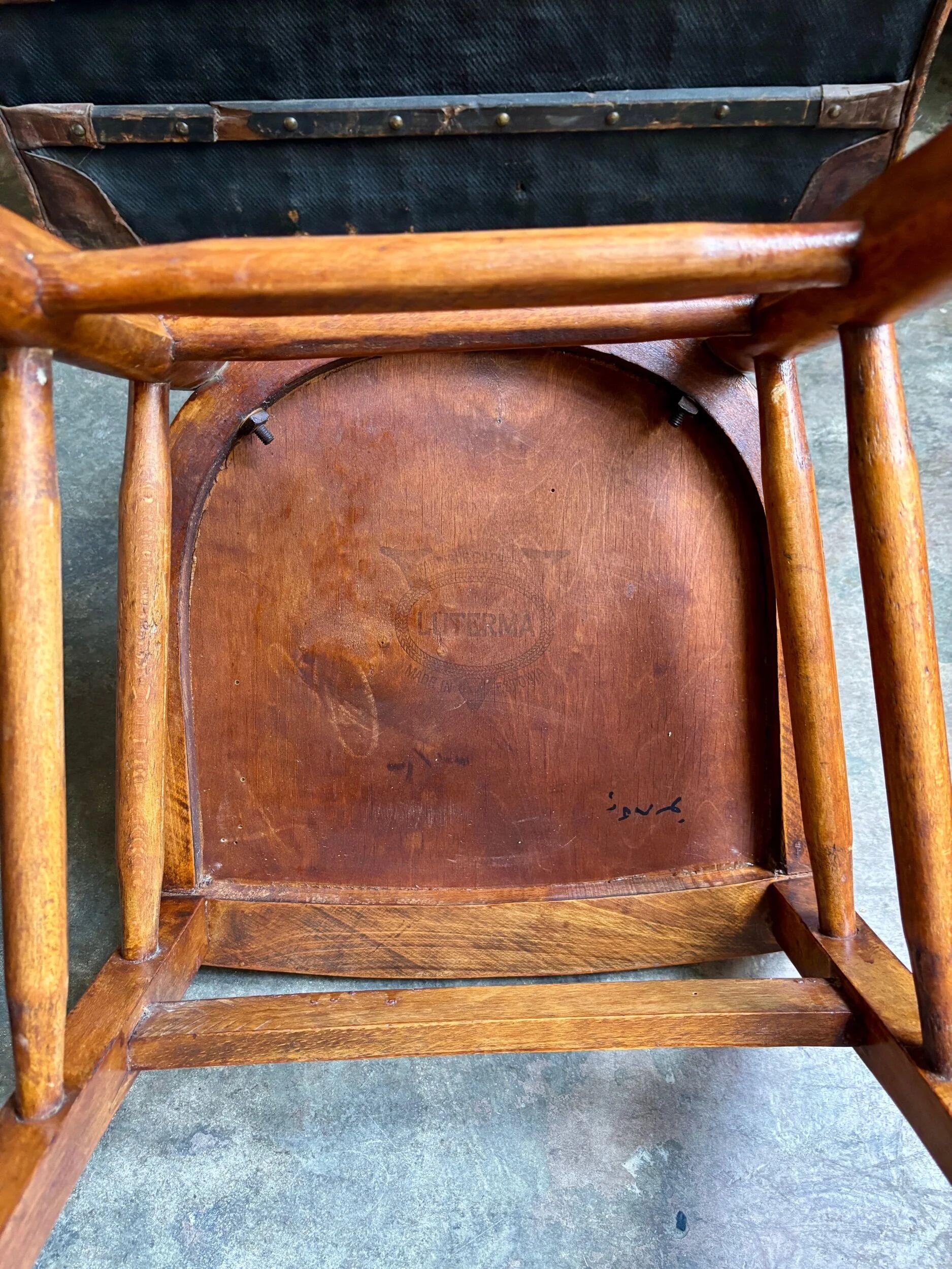 Luterma bistro chair in embossed beech, "shell" pattern.