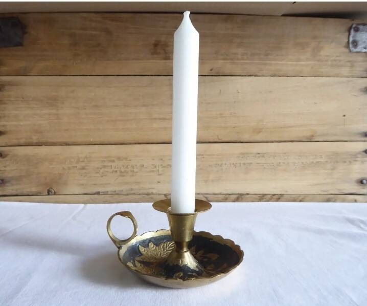 Brass hand candle holder