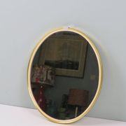 Vintage oval mirror – gold and elegance of the 50s-60s