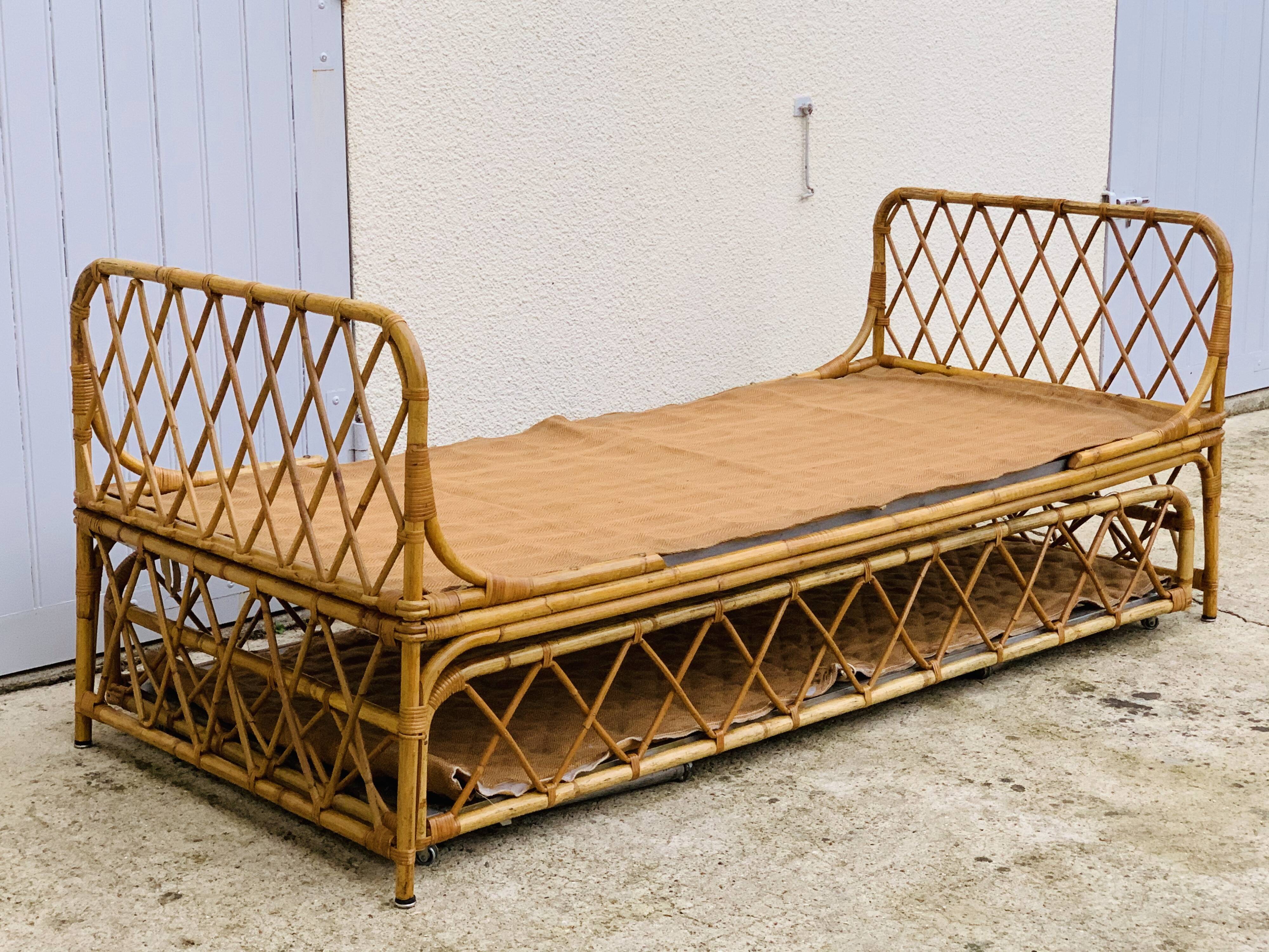 Rattan leg bed 1960