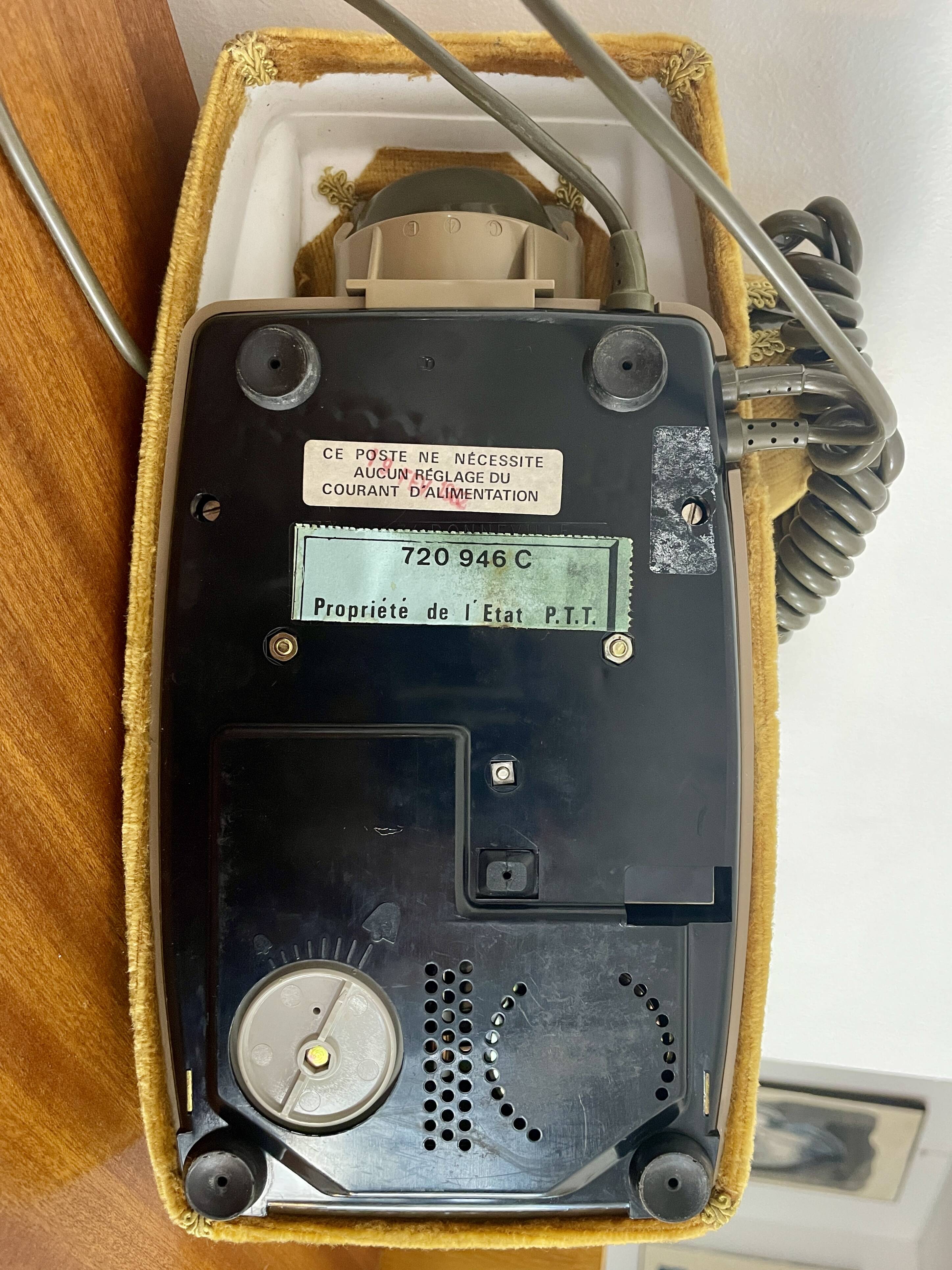 Socotel S63 telephone with its gold velvet shell