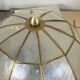 Small ceiling light with a mother-of-pearl shade from the 1950s.