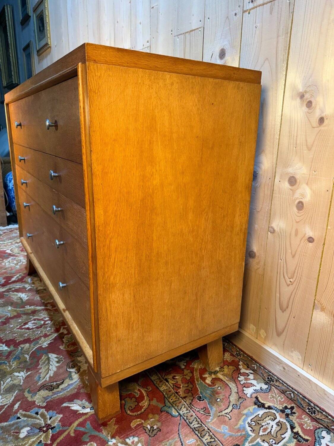 Vintage 1950s oak commode with tapered legs.
