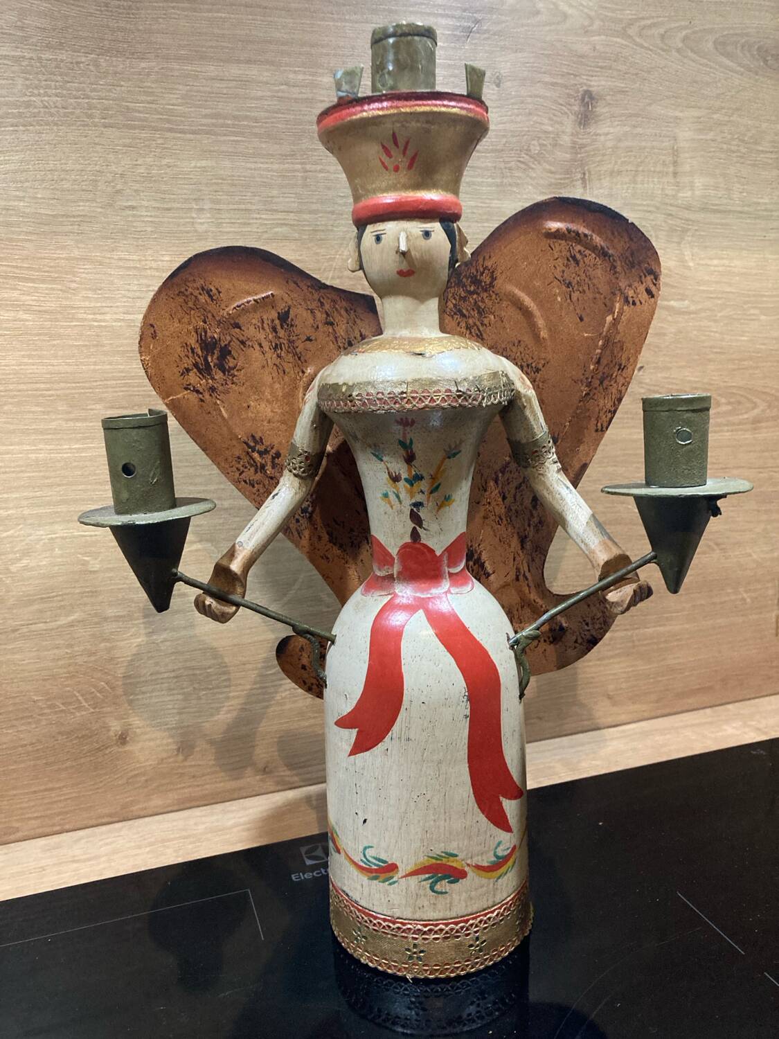 German polychrome wooden angel of light candle holder