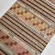 Tapis Kilim rayé vert et orange