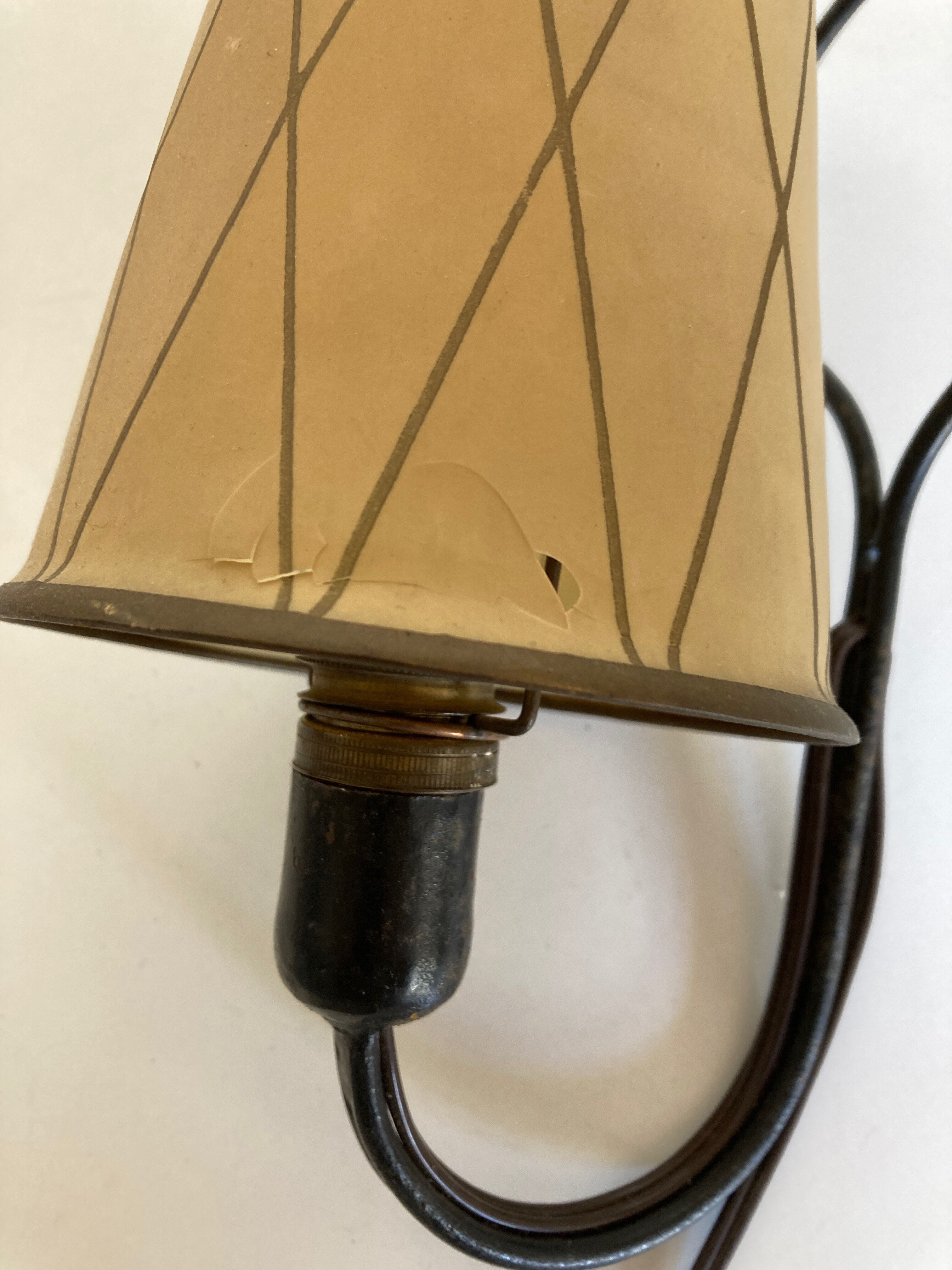 Art deco beaten iron wall lamp