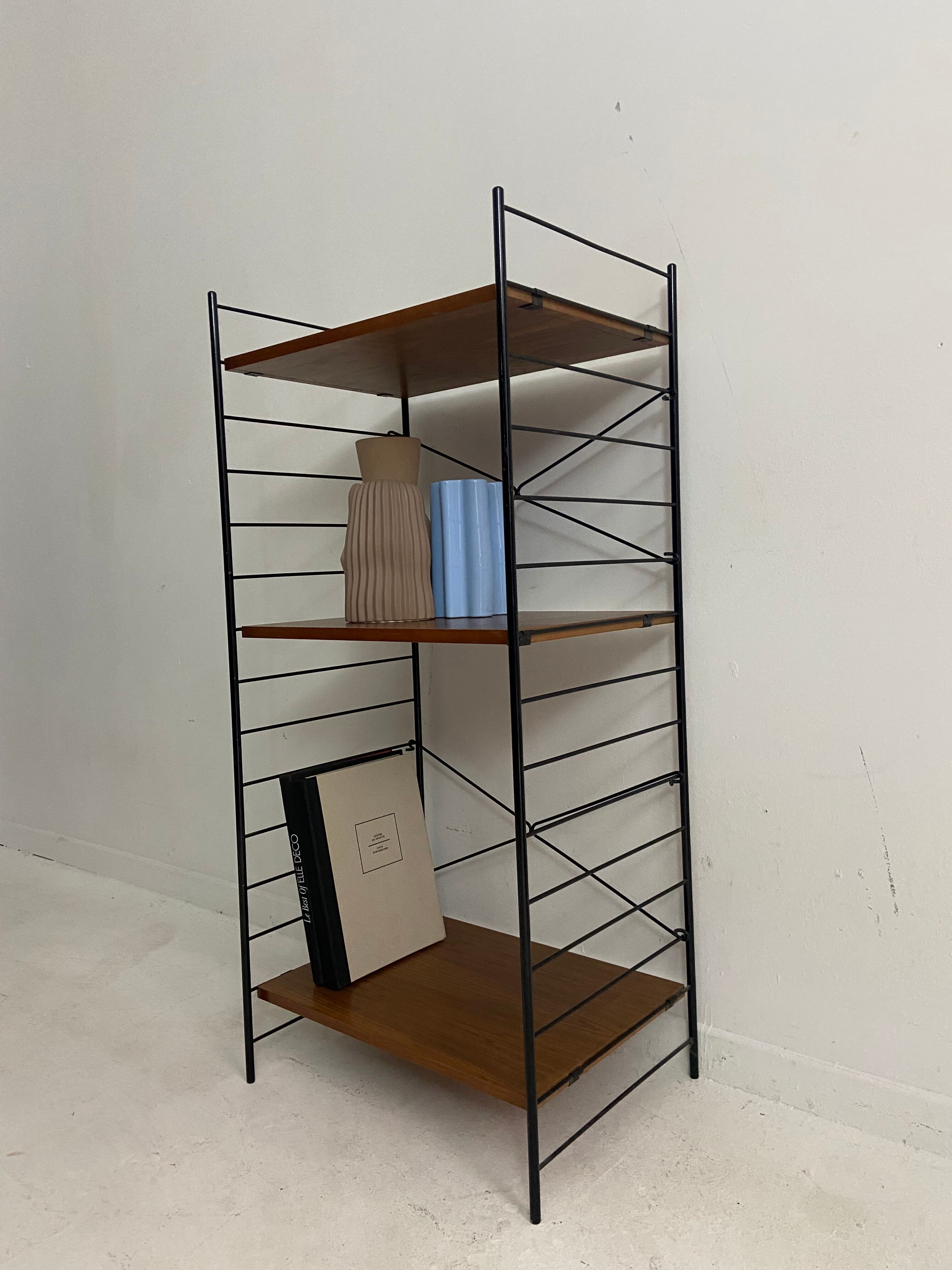 small vintage metal and teak string bookshelf