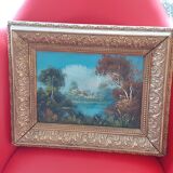 Old oil with golden frame. The lake.