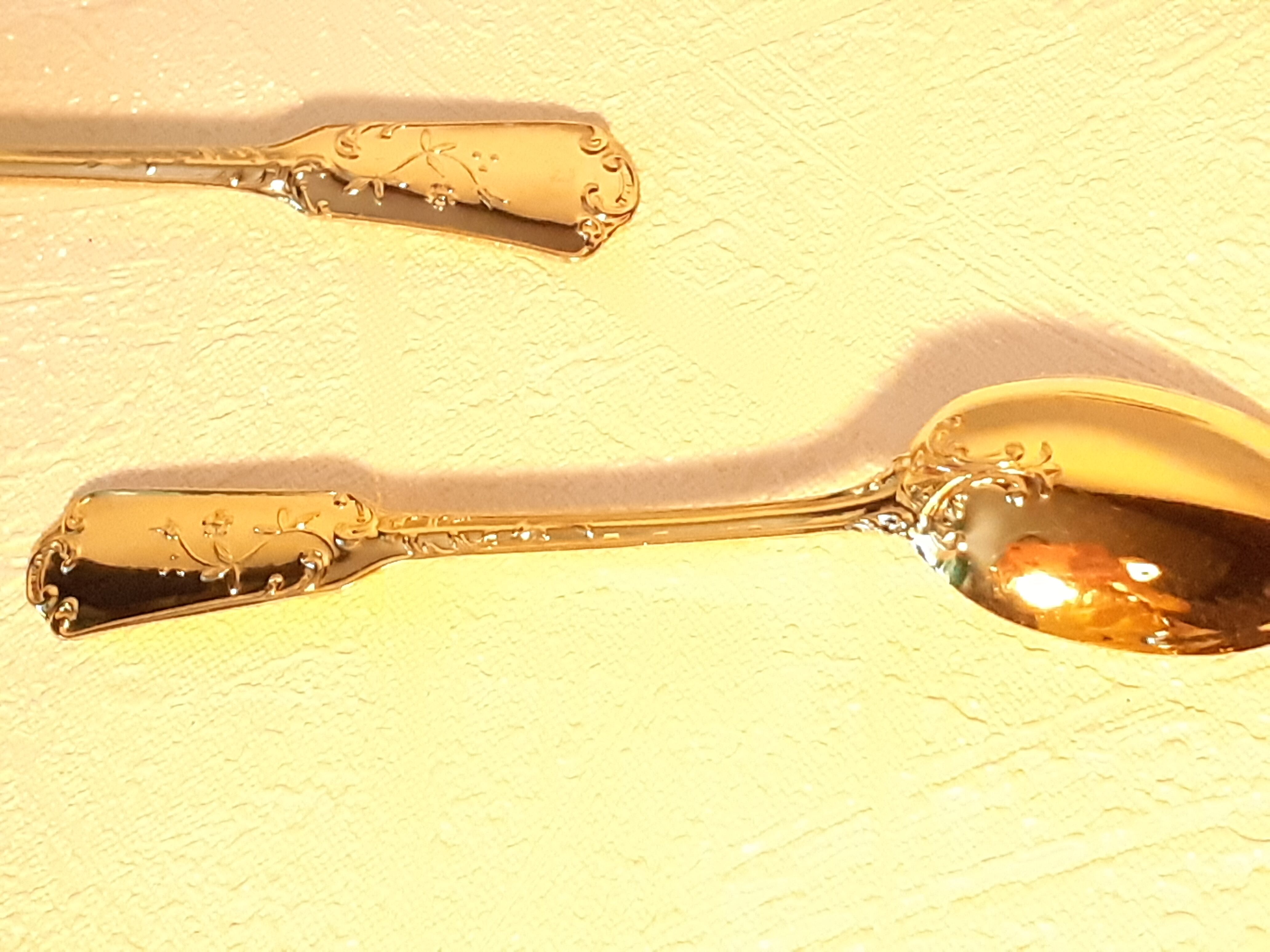 Four small teaspoons/ dessert fine golden gilding