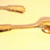 Four small teaspoons/ dessert fine golden gilding