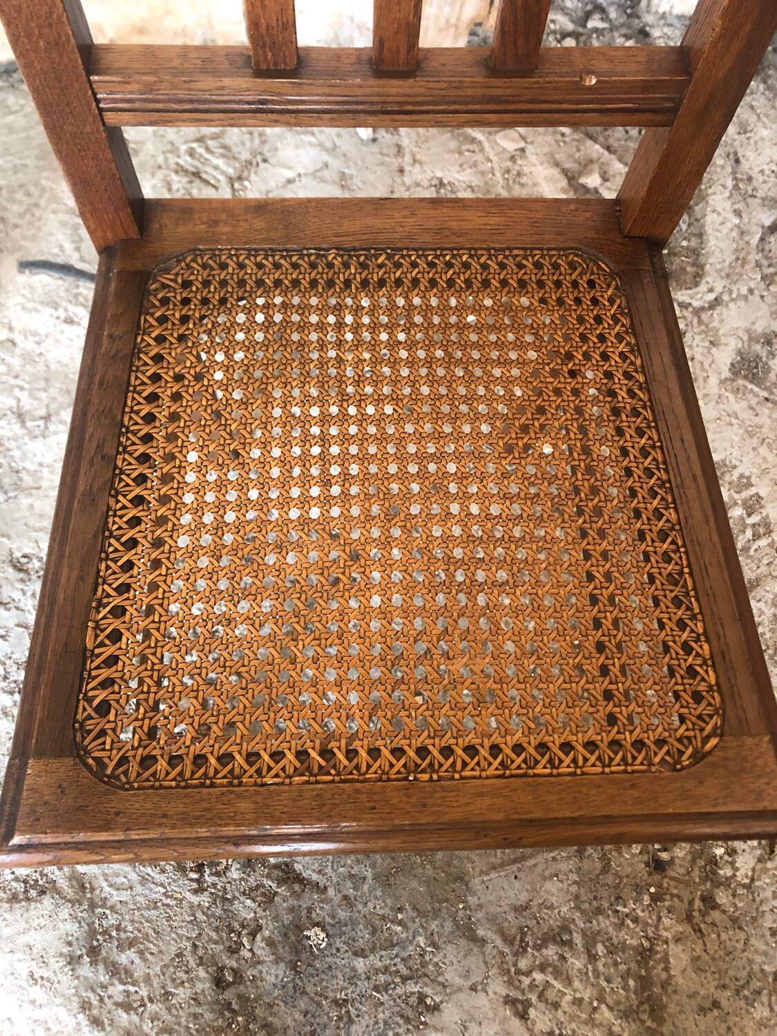 Pair of art deco chairs in wood & cane seat
