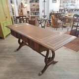 English desk in solid mahogany with lion paws. Leather top