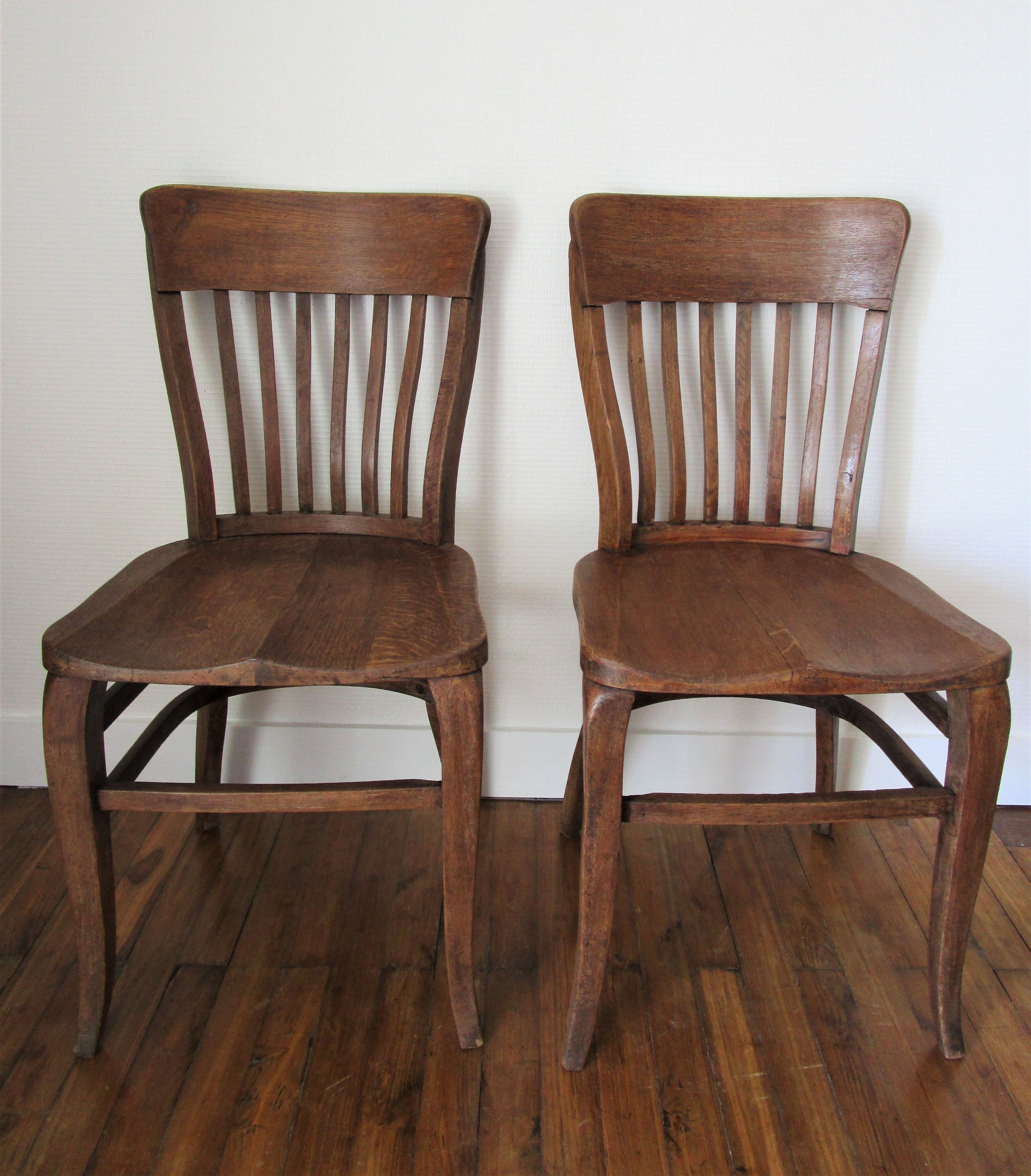 Two chairs solid oak patinated early twentieth century