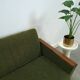 Slaapbank met groene stof en teakhout