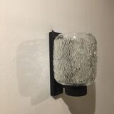 Black metal and molded glass wall sconce