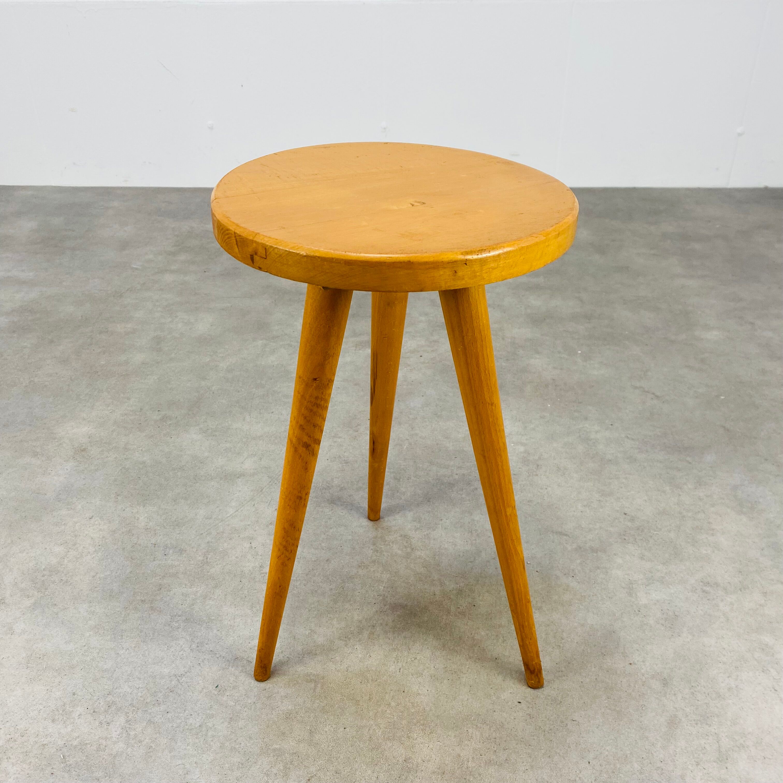 Vintage blond wood tripod stool