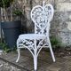 Chaise cœur Peacock rotin blanc 1970
