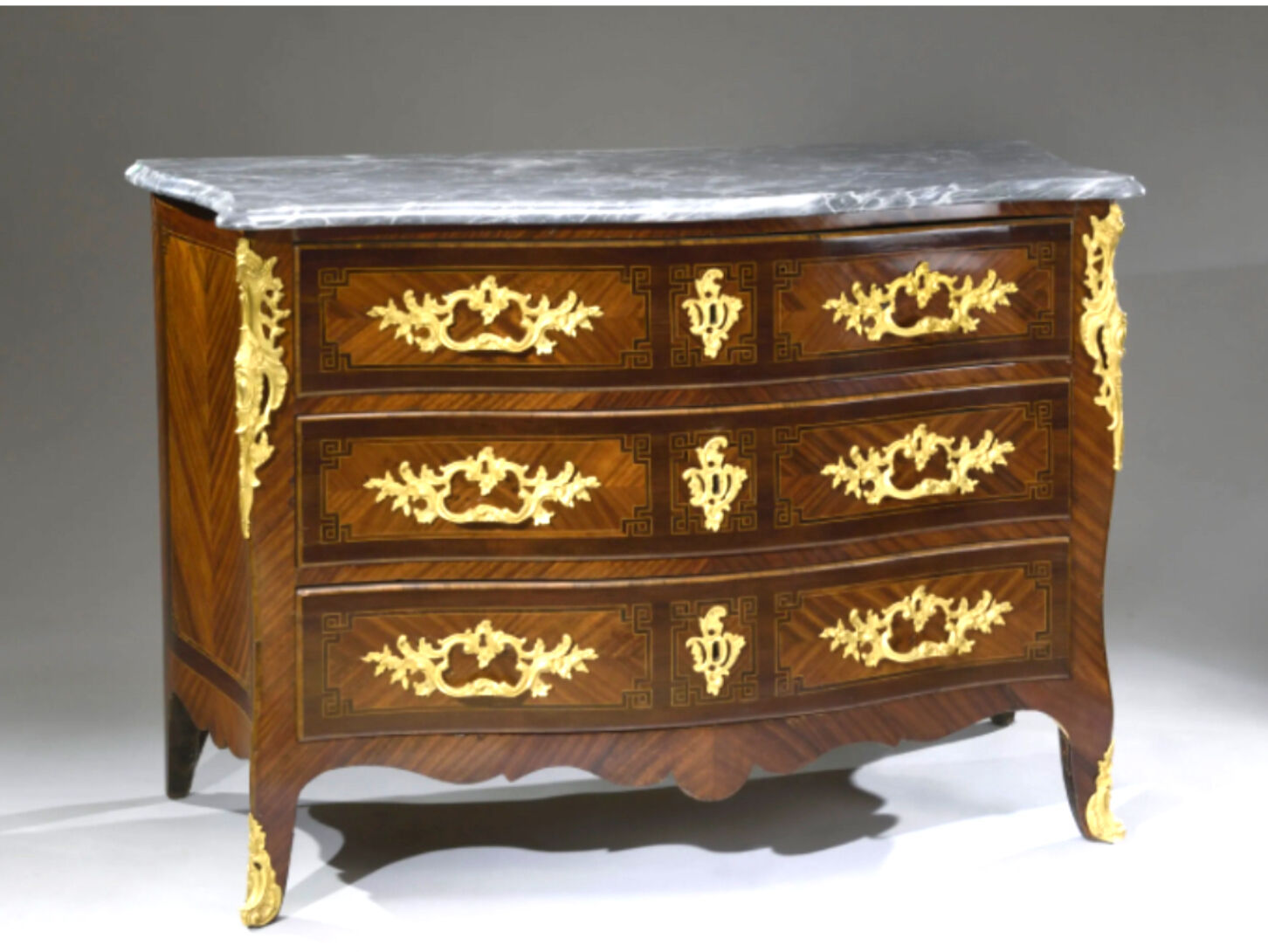 Louis XV period chest of drawers in violet wood.bronze trim