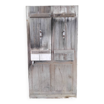 Old door with vintage wooden shutters