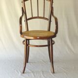 Small canned armchair; in curved wood, bistro, 1890