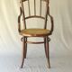 Small canned armchair; in curved wood, bistro, 1890