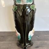 Antique ceramic vase by De Bruyn with floral decoration.