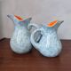 Pair of ceramic pitchers