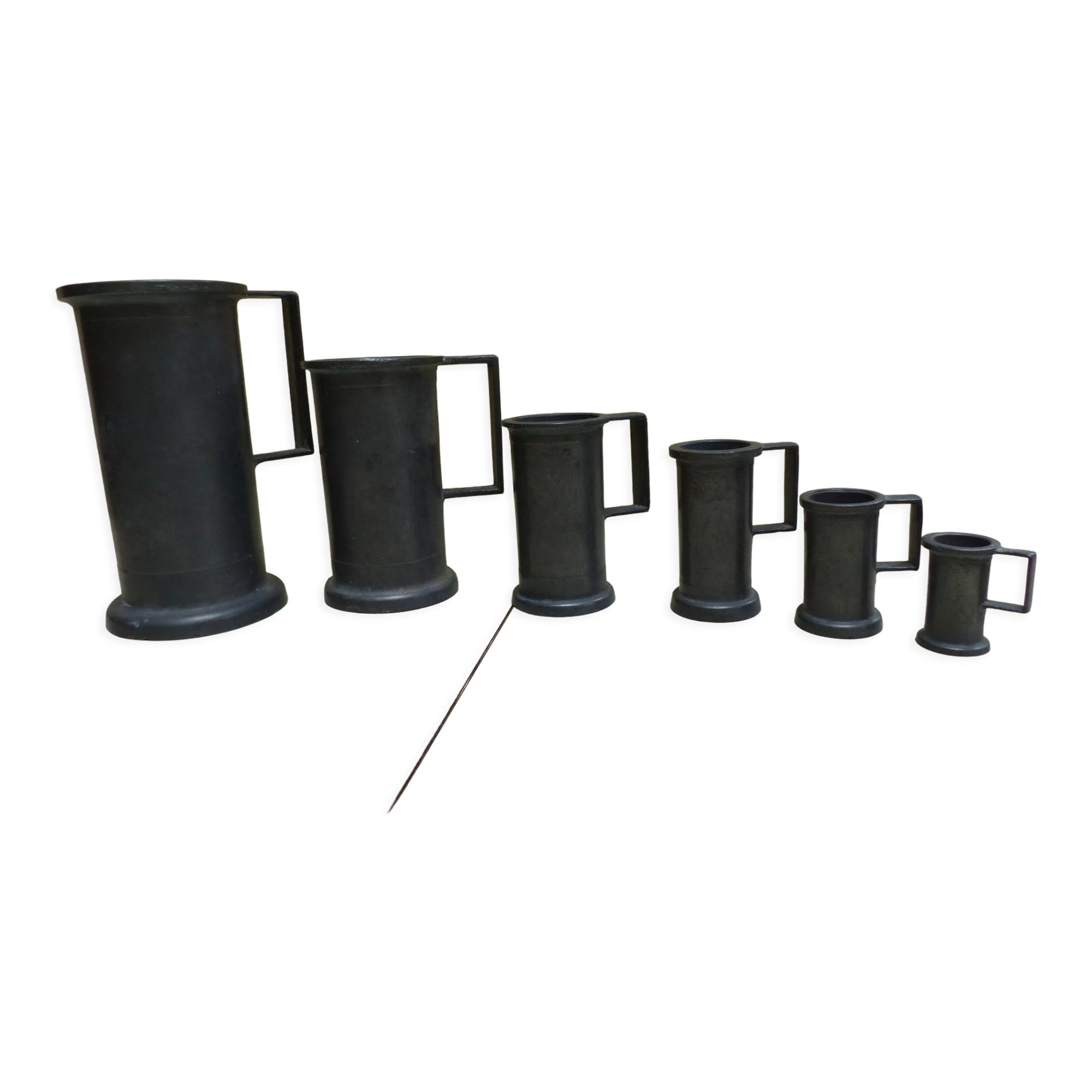 Set of 6 Fleur de Lys pewter measuring pots