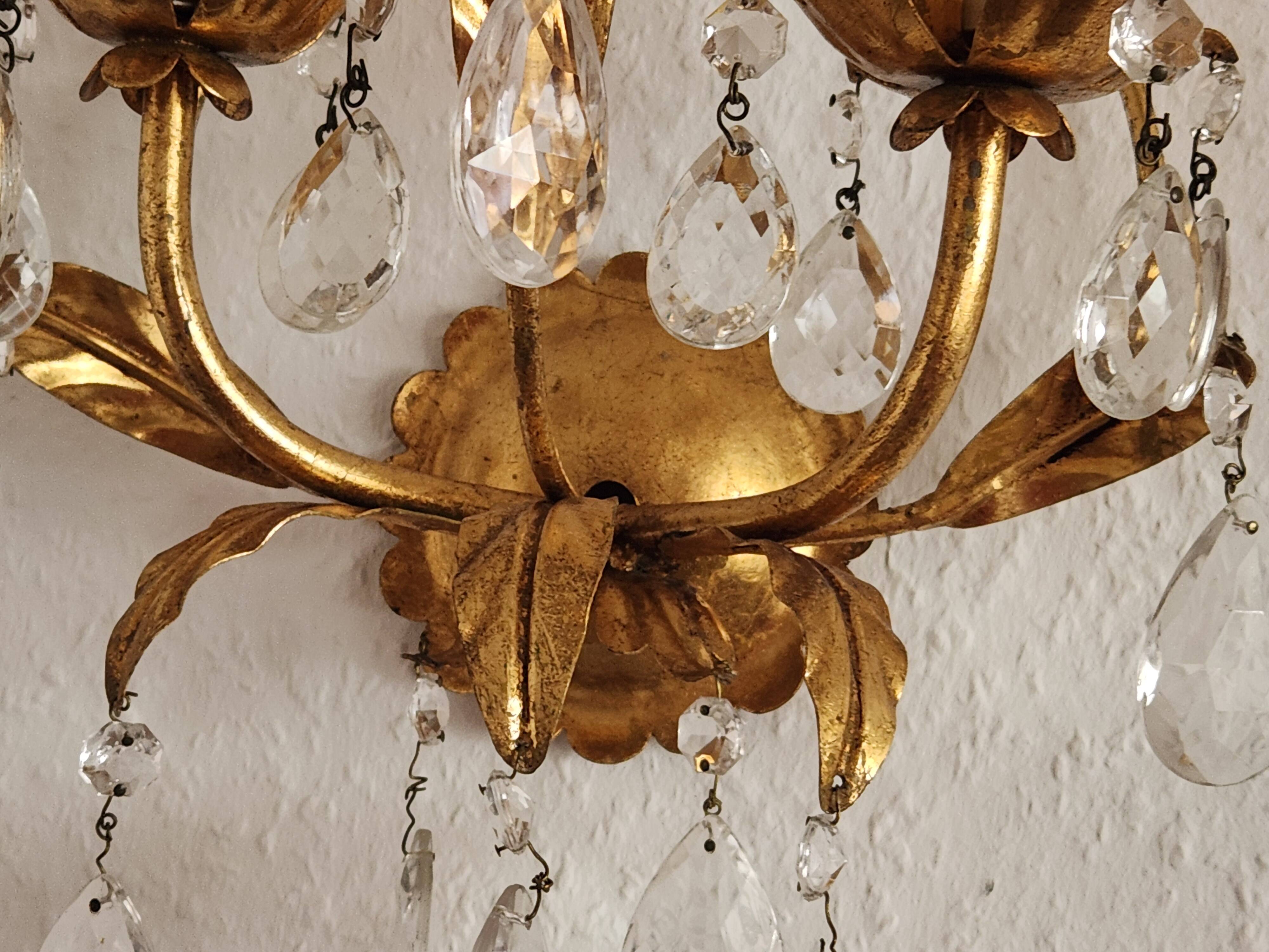 Hand-forged wall lamp gilded with gold leaf and crystals, Italy