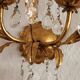Hand-forged wall lamp gilded with gold leaf and crystals, Italy