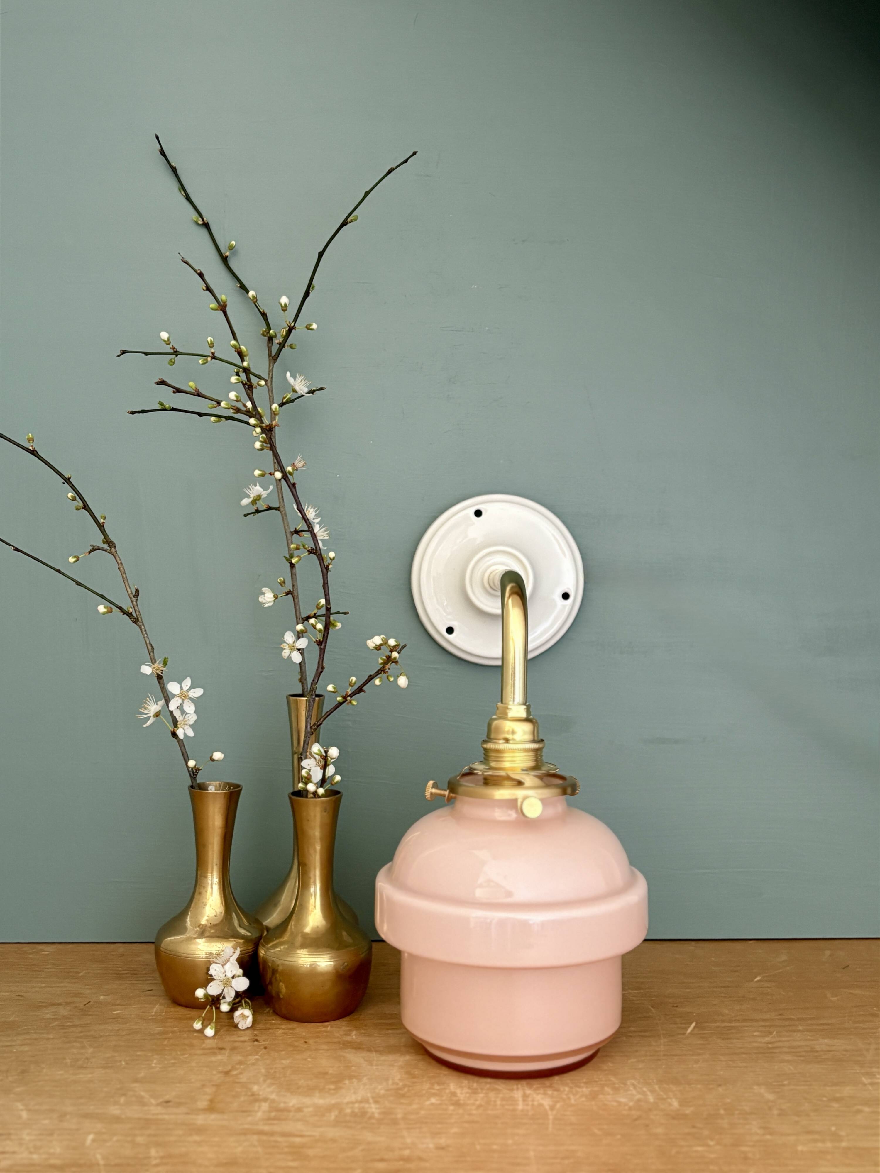 Vintage pink opaline globe wall light.