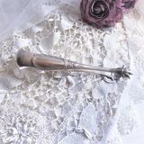 Ice cube pliers or sugar in's feet chiseled silver metal and punches
