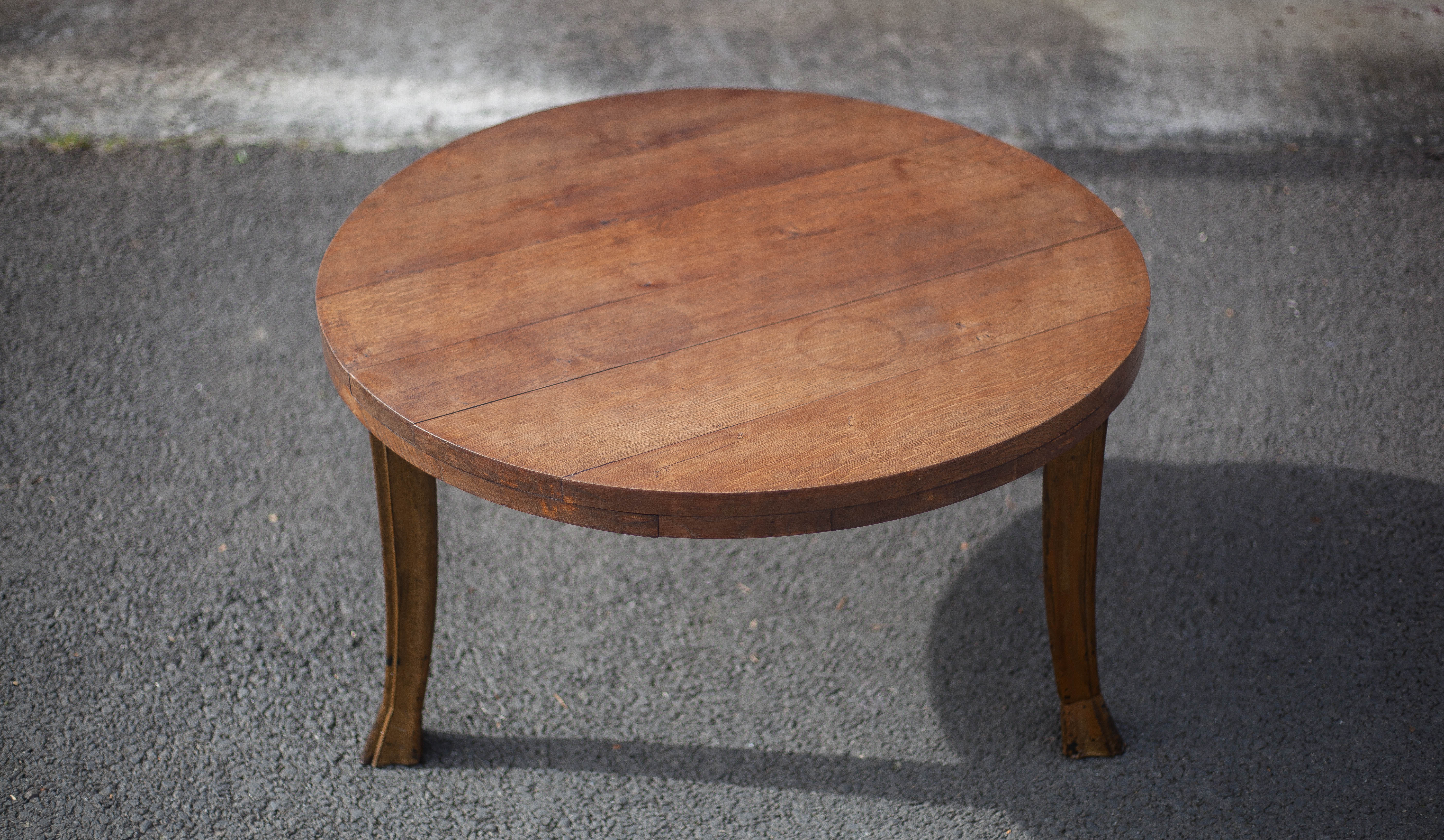 Wooden coffee table with cast iron legs