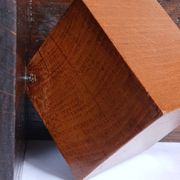 Cubist pair of bookends made of stained solid wood, 1960.