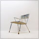 Vintage perforated metal armchair from the 1950s.