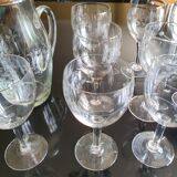 Set of 10 glasses and an engraved glass pitcher
