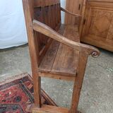 Oak church bench period XVII th century, back decorated with carved parchments