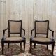 Pair of Louis XVI period caned armchairs
