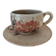 Large stoneware cup and saucer with floral decoration – 1970s