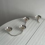 Shiny stainless steel candlestick holder