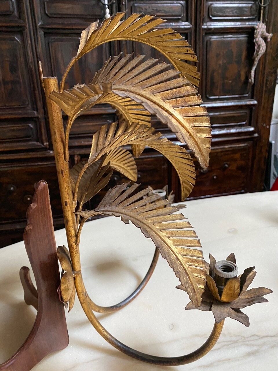 Pair of vintage golden palm leaf sconces