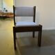 Pair of brutalist chairs in solid wood and jacquard fabric.