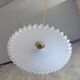 Serrated opaline suspension