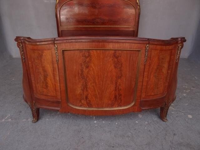 Golden bronze Louis XVI style mahogany bed