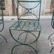 Deux fauteuils et deux chaises de jardin en fer forgé 20 eme
