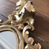 Pair of gilded rococo mirrors in carved wood