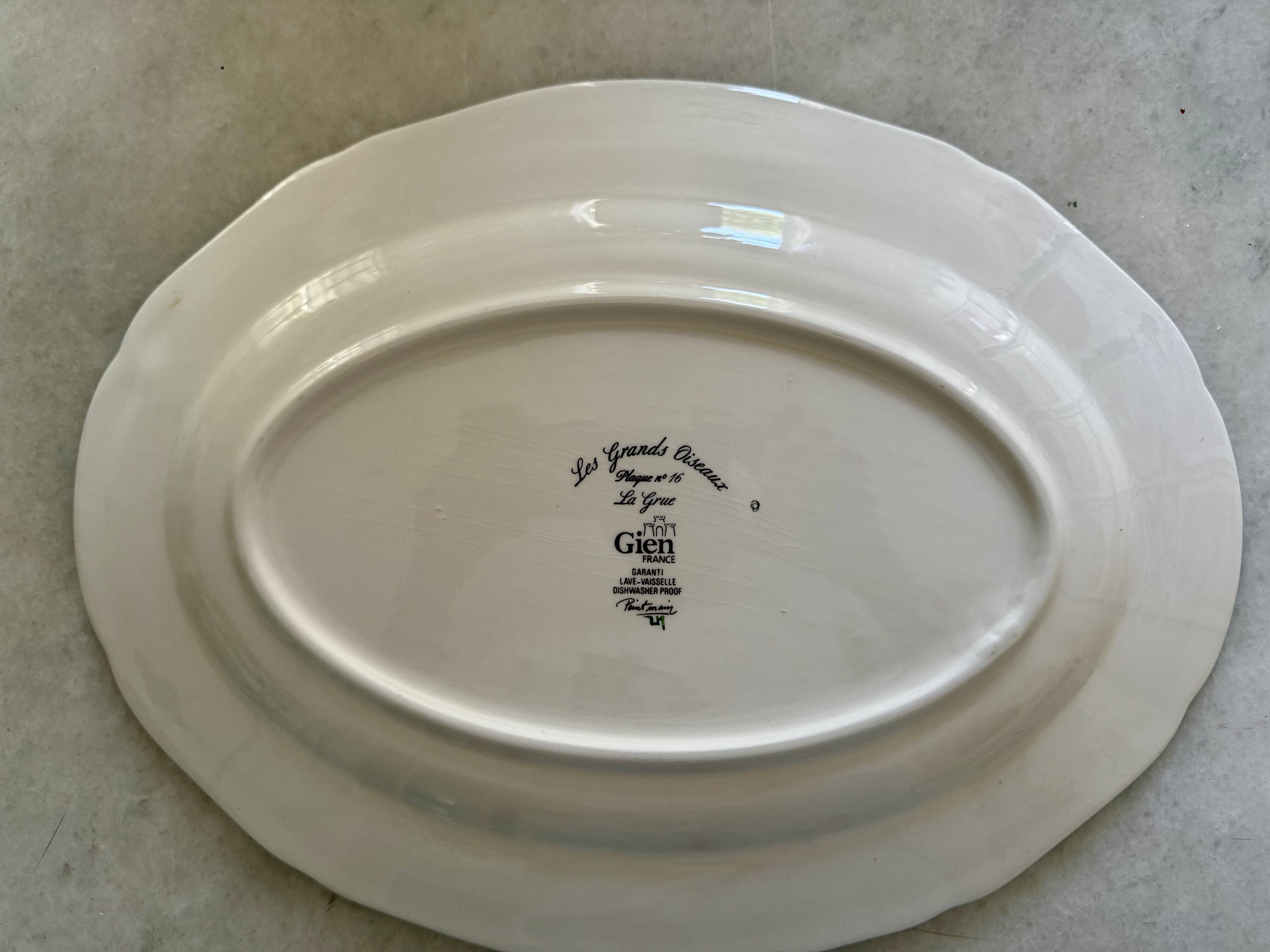 Service de table assiettes et plats Gien modèle grands oiseaux